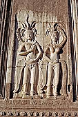 Angkor Wat temple, second enclosure, devatas sculpted in bas-relief with an extraordinary variety of intricate hair styles and costumes. 